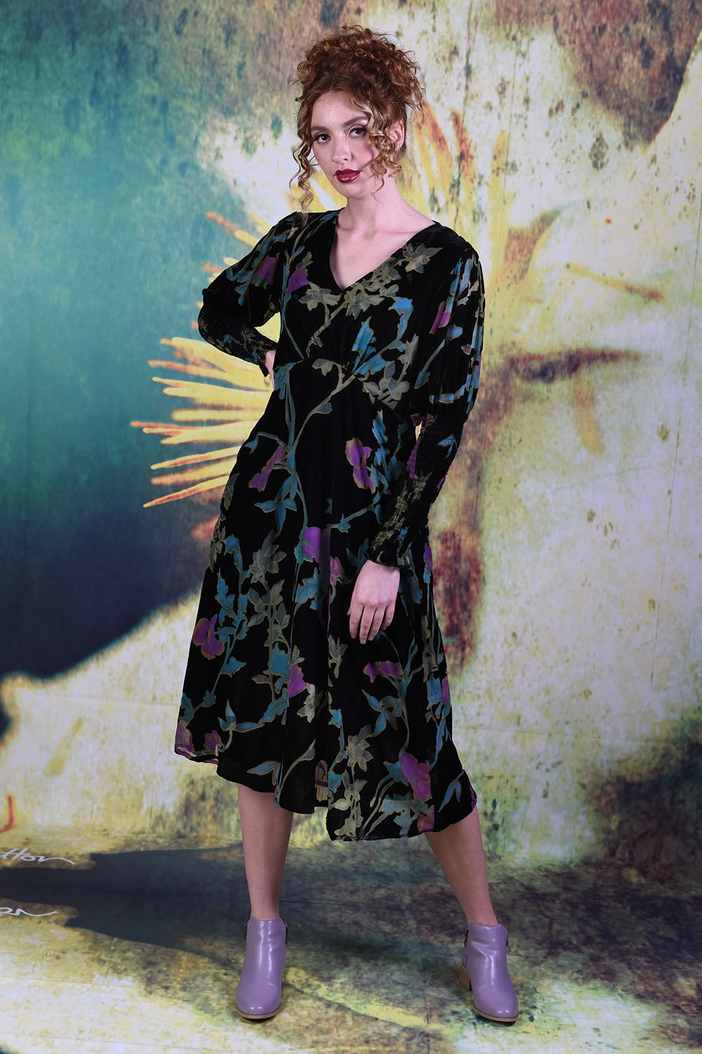 Model wearing the Annah Stretton Winter Rose Dress in Black Burnout