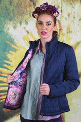 Close-up of model wearing the Annah Stretton Ambrosia Puffer Jacket in navy