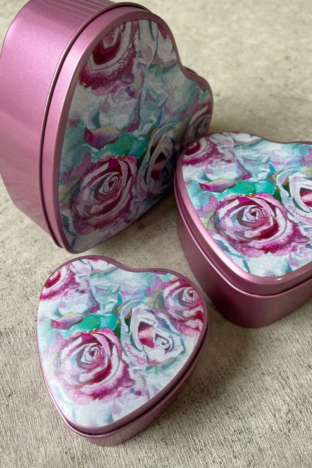 stacking heart shaped tins in pink, by annah stretton