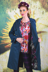 Closer shot of model wearing the Annah Stretton Trench coat in slate