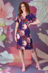 Model wearing Austin Dress in Indigo Dahlias print by Annah Stretton