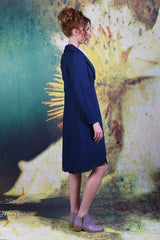 side of model wearing the Annah Stretton Brisa Bailey jacket in navy