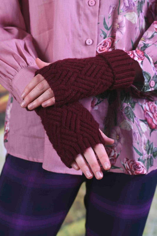 Model wearing the Annah Stretton Cashmere Gloves in wine