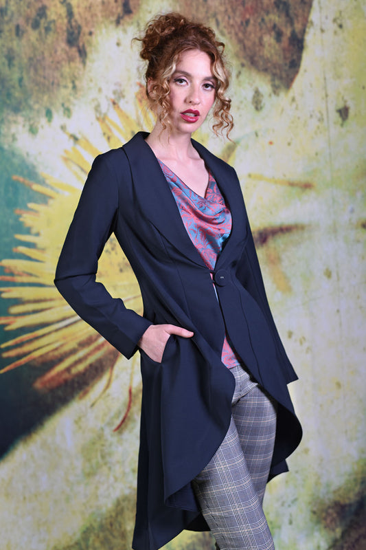 Model wearing the Annah Stretton Celia Olivia jacket in navy