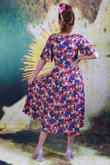 Back of model wearing the Annah Stretton Down the Line Dress in Echinacea
