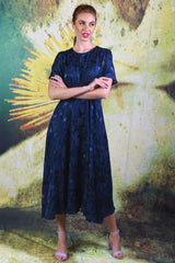 Model wearing the Ocean Blue Fabia Dress by Annah Stretton 