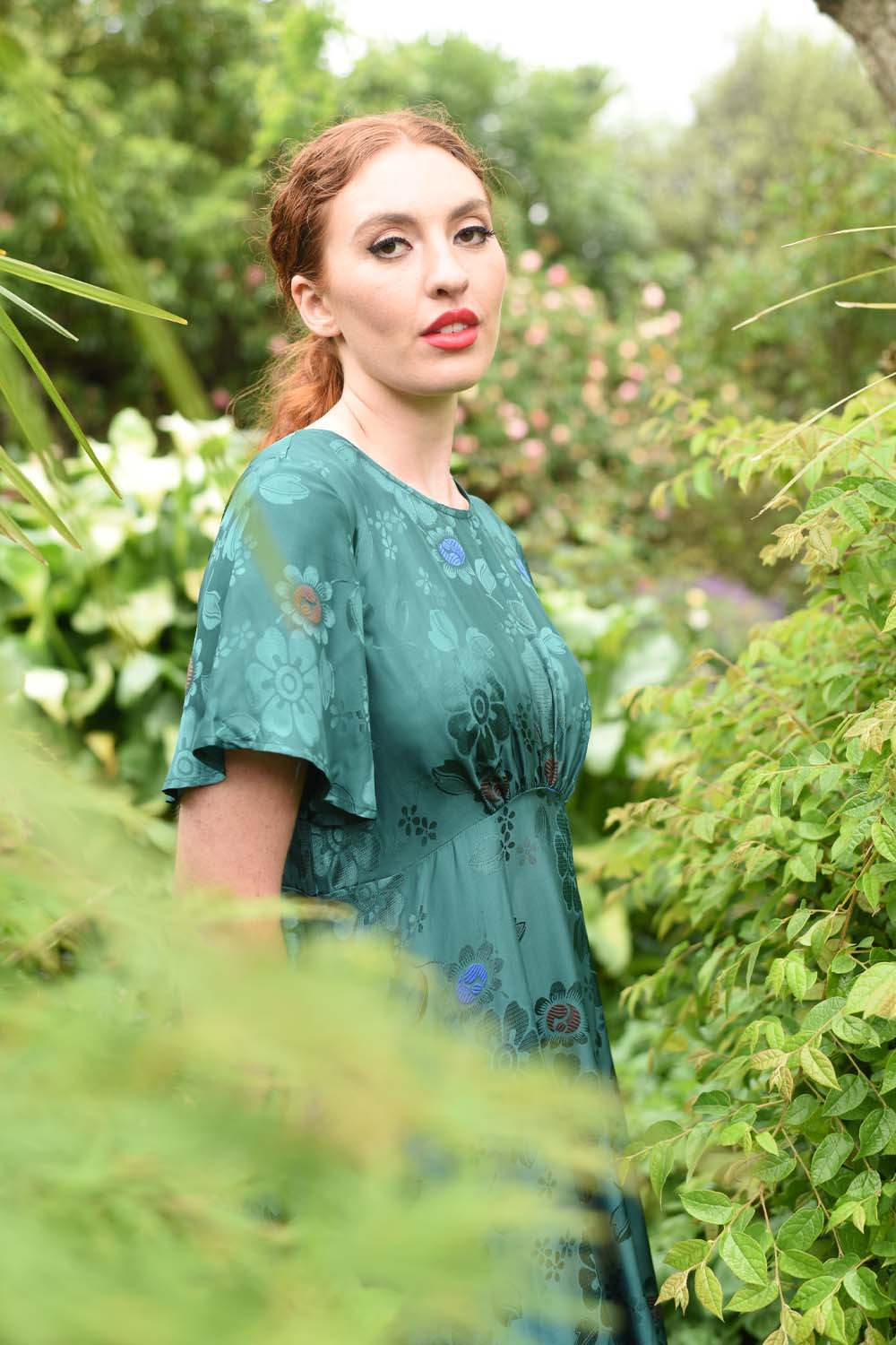 model wearing fabia emerald dress