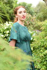 model wearing fabia emerald dress
