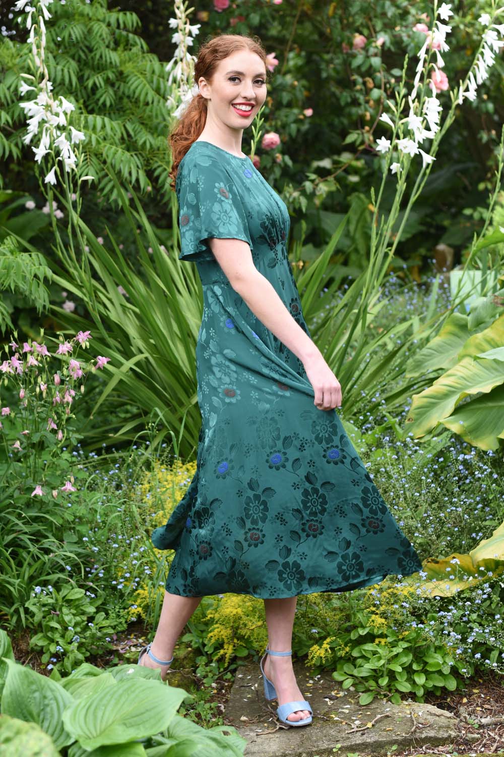 model wearing fabia emerald dress