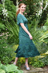 model wearing fabia emerald dress