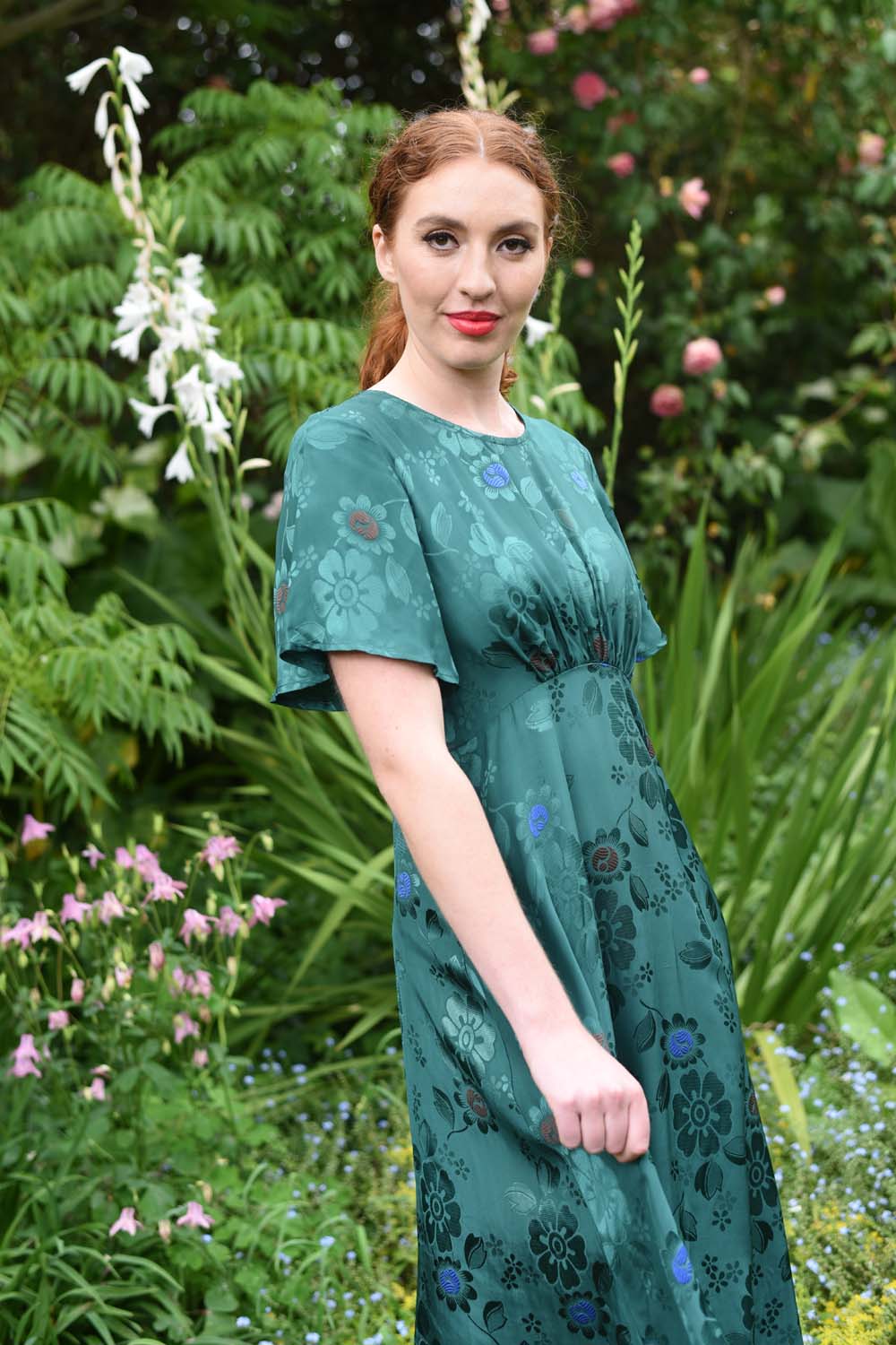 model wearing fabia emerald dress