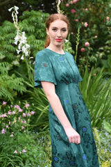 model wearing fabia emerald dress