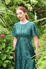 model wearing fabia emerald dress