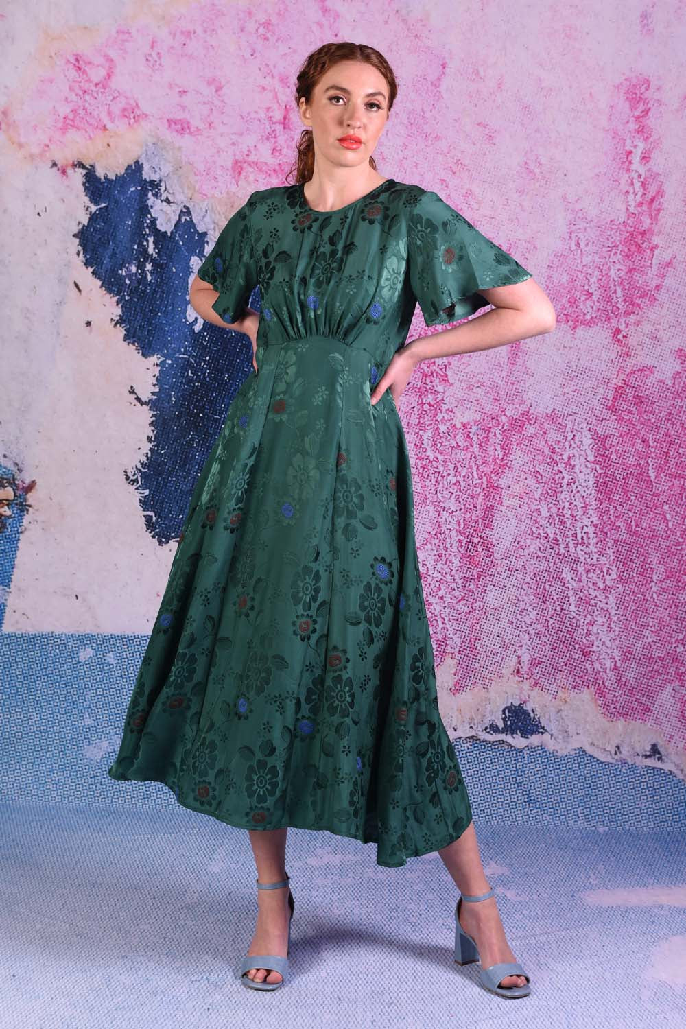 model wearing fabia emerald dress