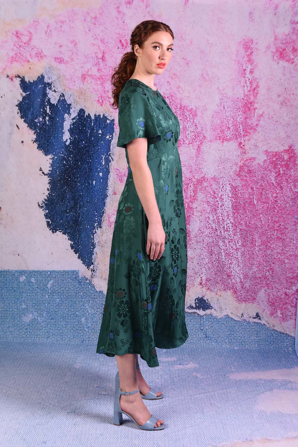 model wearing fabia emerald dress