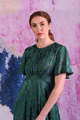model wearing fabia emerald dress