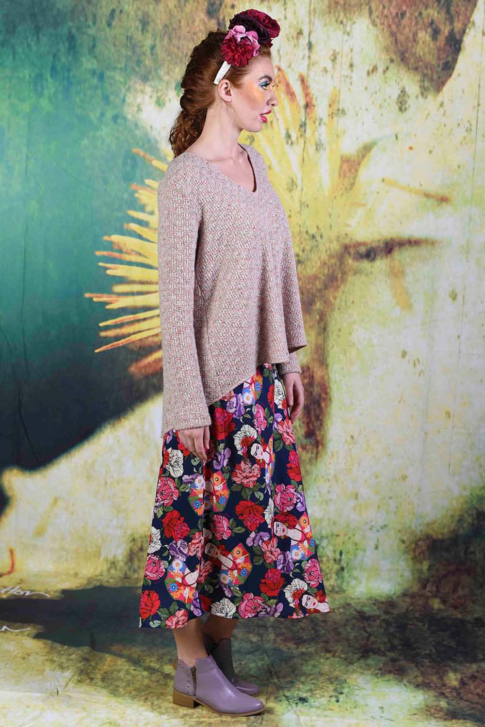 Side of model wearing the Gretel Grace Knit in creme