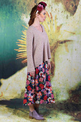 Side of model wearing the Gretel Grace Knit in creme