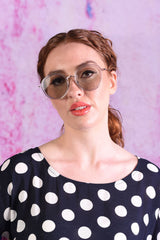 Model wearing Hudson sky sunglasses.