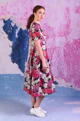 model wearing Jalene floral navy dress