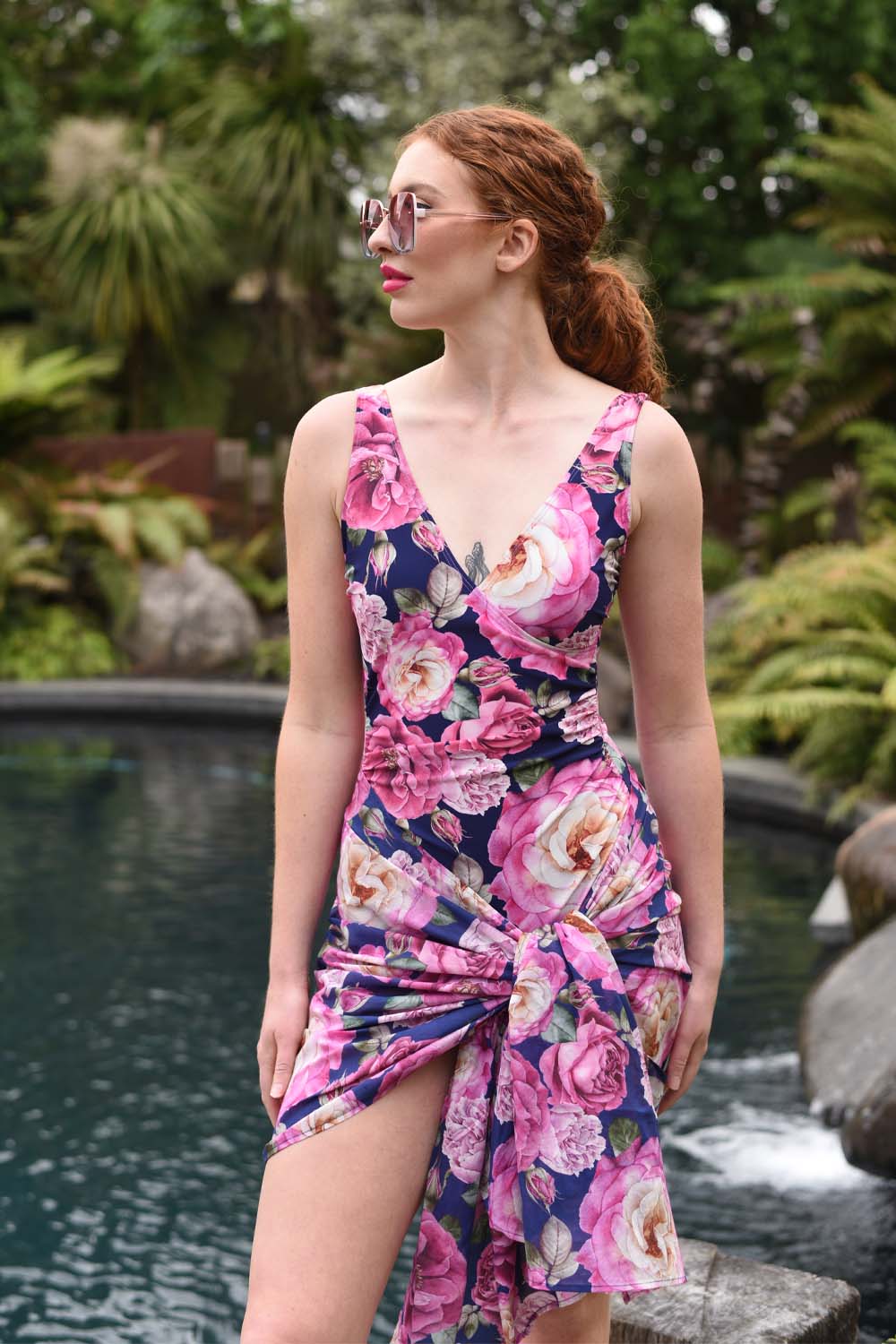 model wearing lily bather in navy and pink peony floral print