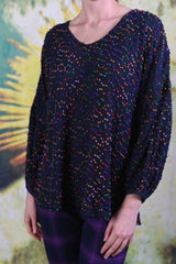 Close-up of Annah Stretton Lola Top featuring small multi-coloured pompoms