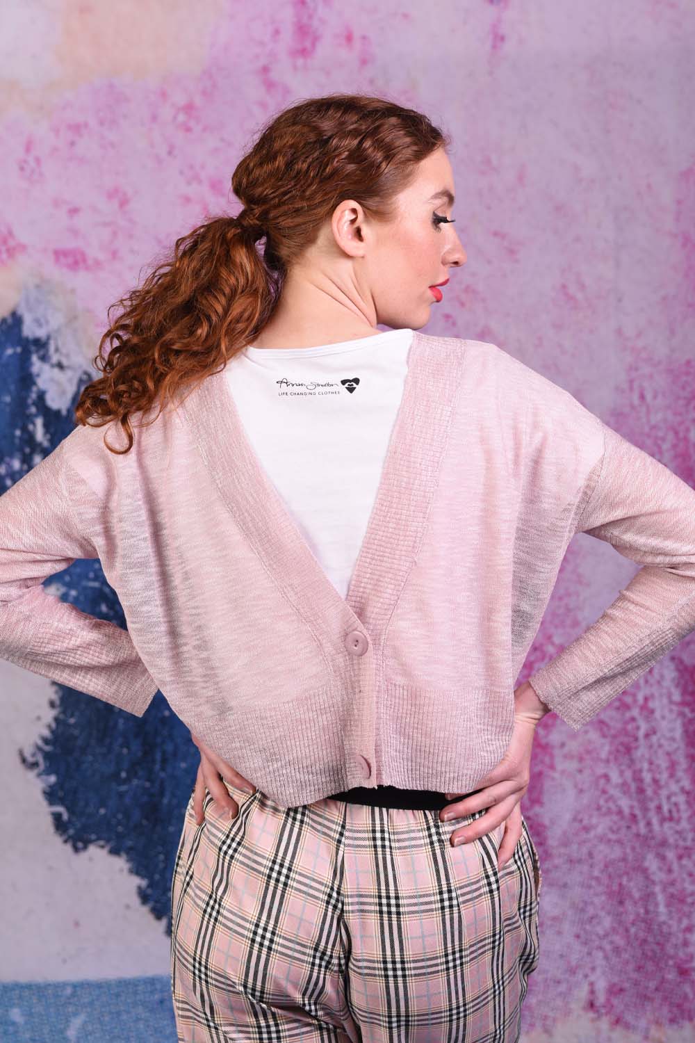 model wearing maggie may cardi in pink