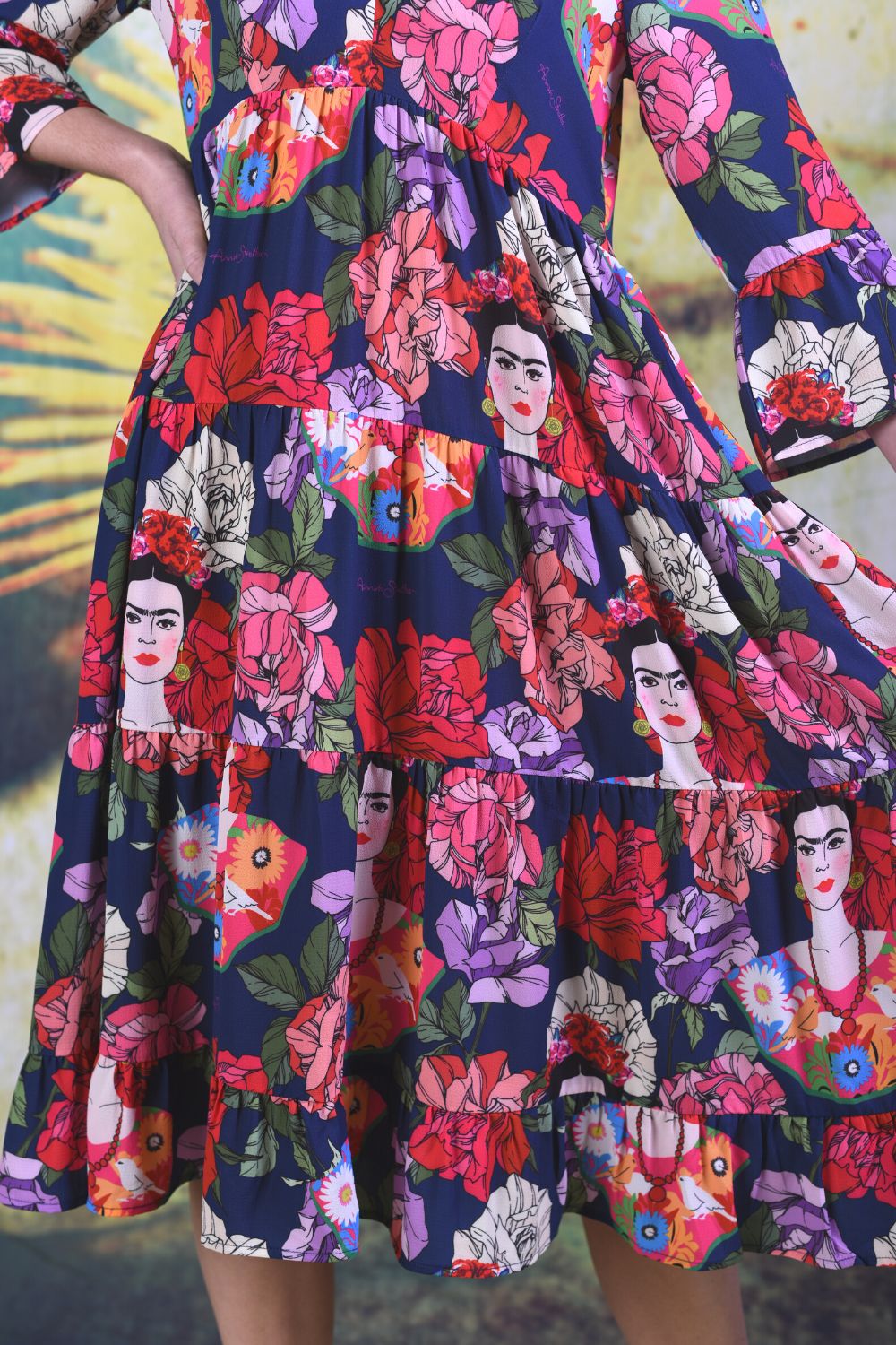 Close-up of the Magic Rita showing navy floral tiered skirt