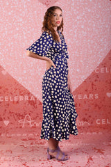 model wearing marshy may navy spot dress