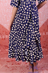 model wearing marshy may navy spot dress