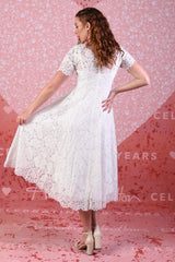 model wearing light ivory dress with slip
