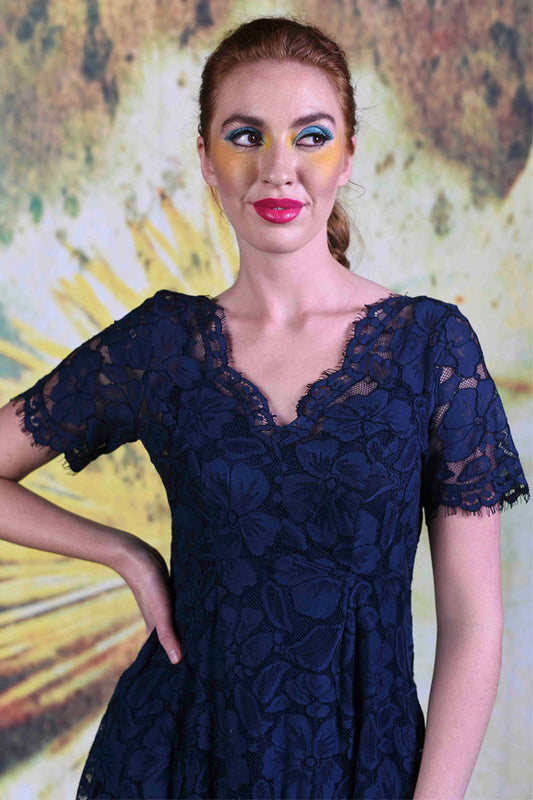 Close-up of model wearing the Annah Stretton Moonlight Dress in navy