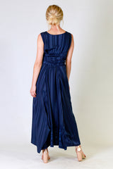 myra may dress in blue with stripe detail, back view