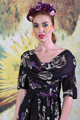 Close-up of model wearing the Annah Stretton Pearl Dress in black