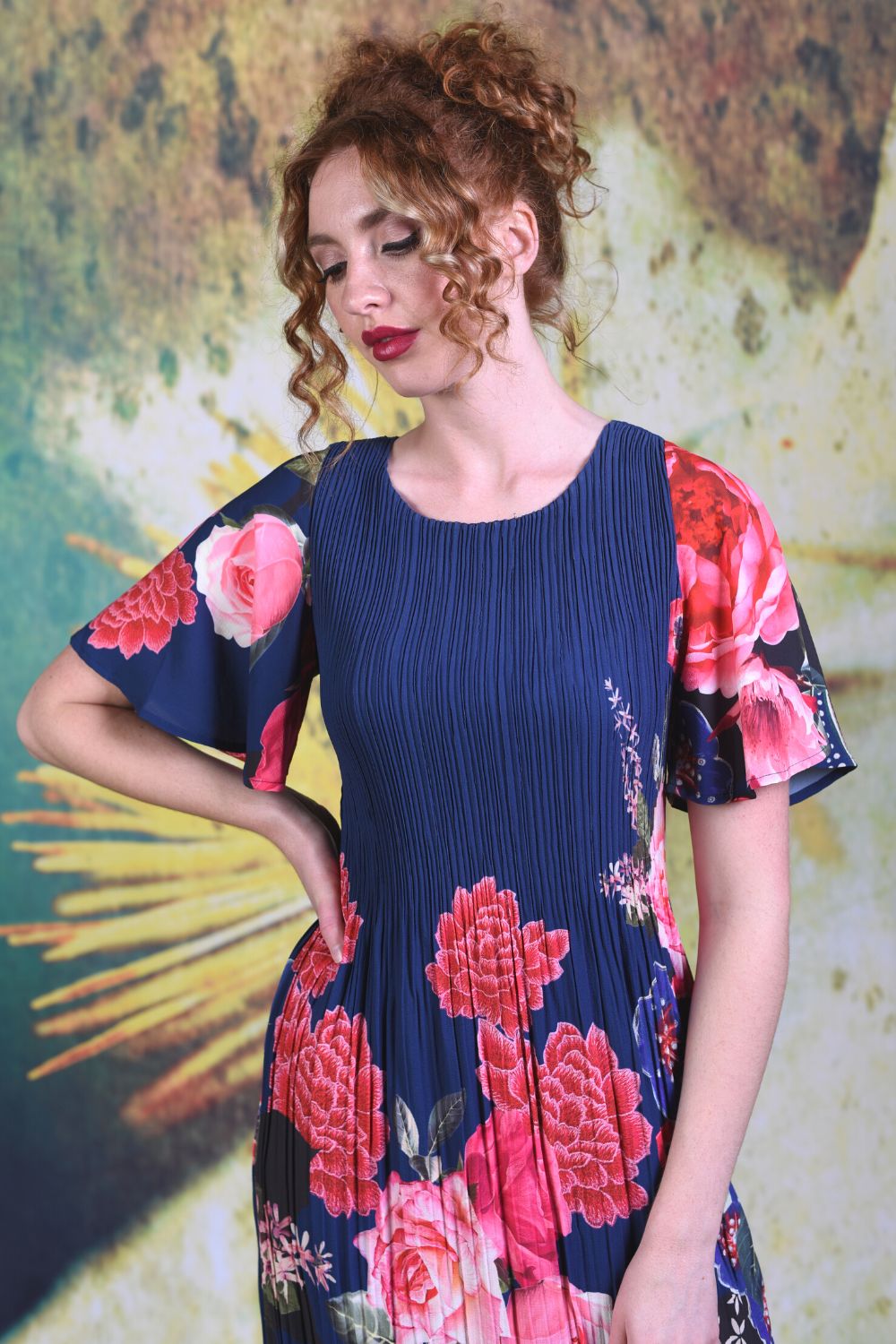 Closer shot of model wearing the Annah Stretton Pleat Me Juliet Dress in Peony