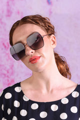 Model wearing black Suede sunglasses.