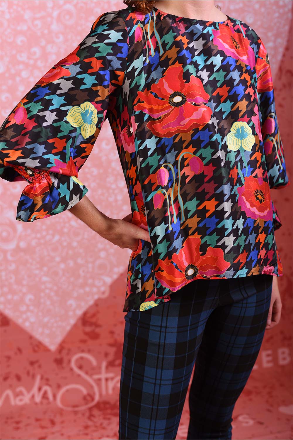 model wearing sunny silky red poppy top
