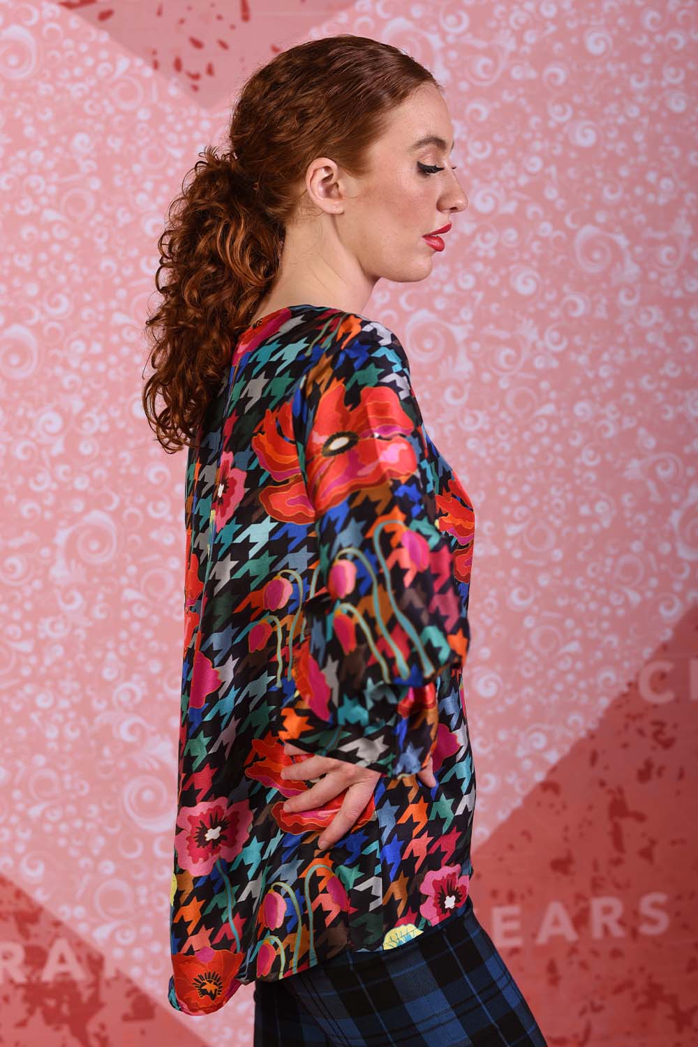 model wearing sunny silky red poppy top