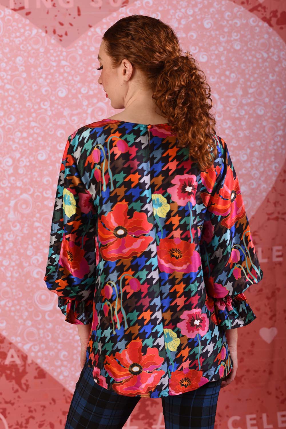 model wearing sunny silky red poppy top
