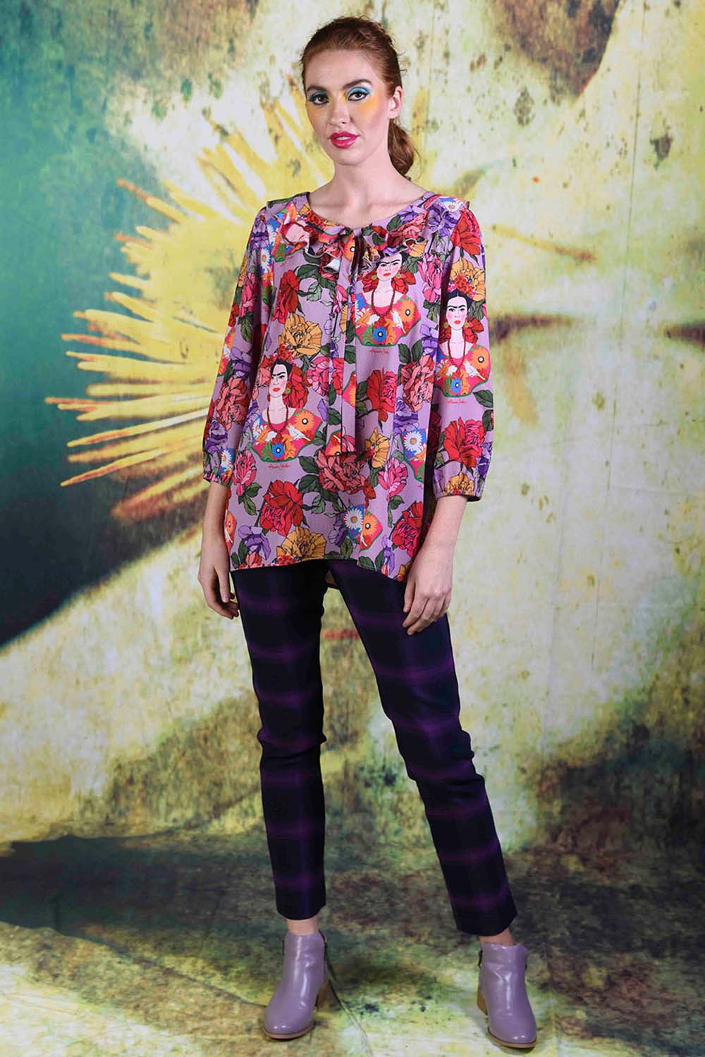 Model wearing the Tiger Liana top in mauve by Annah Stretton