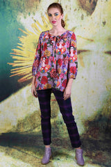 Model wearing the Tiger Liana top in mauve by Annah Stretton