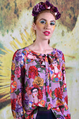 Close-up of model wearing the mauve Tiger Liana top by Annah Stretton