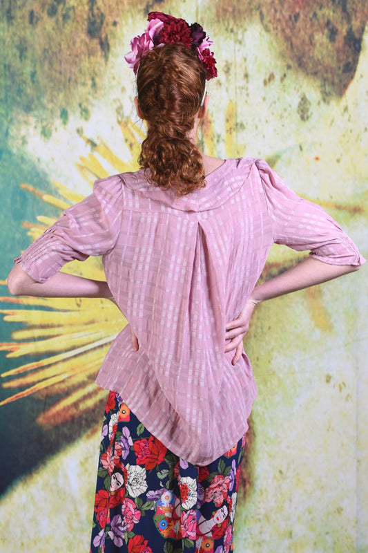 Back of model wearing the Annah Stretton Tiger Lily top in dusky pink
