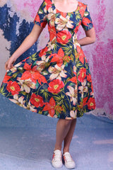 model wears virginia christy navy dress