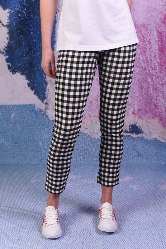 model wearing vita violet black and white check pants